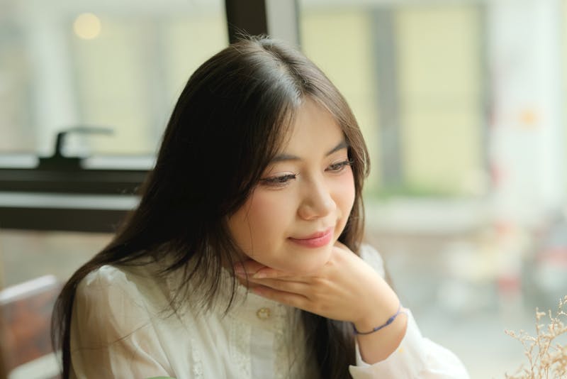 Friendly front of house staff member at Dewey's Pizza